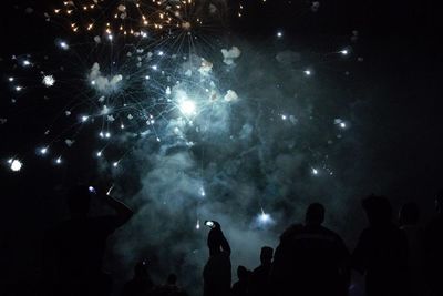 Firework display at night