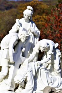 Close-up of statue against white wall