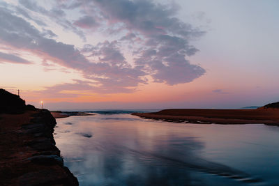 Scenic view of sea against sky during sunset