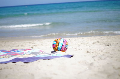 Multi colored umbrella on beach