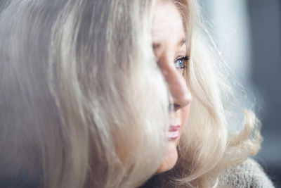 Close-up of thoughtful woman with gray hair