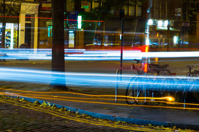 Light trails on city street at night