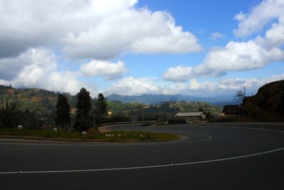 Road against cloudy sky