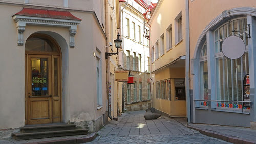 Alley amidst buildings in city
