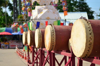 Close-up of drums in row on table