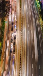 High angle view of light trails on road at night