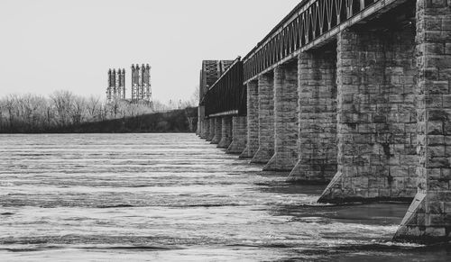 Bridge over river against sky