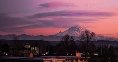 Scenic view of silhouette mountains against sky at sunset