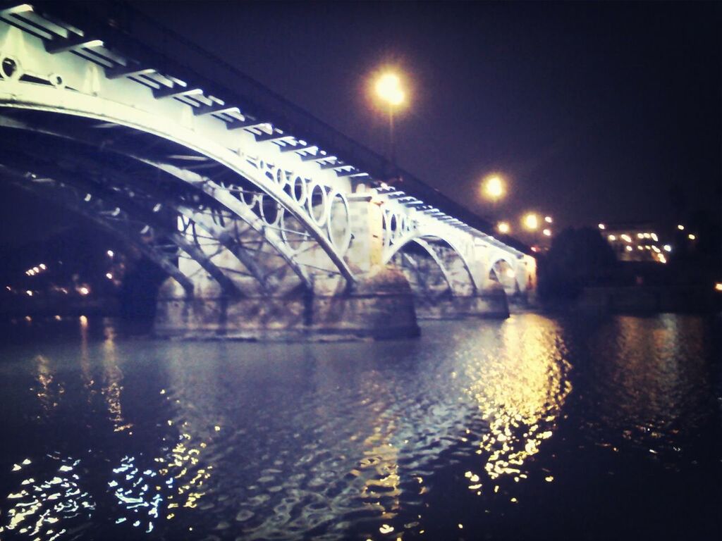 bridge - man made structure, connection, water, transportation, built structure, architecture, reflection, illuminated, river, waterfront, night, bridge, engineering, arch bridge, arch, sky, mode of transport, outdoors, no people, canal