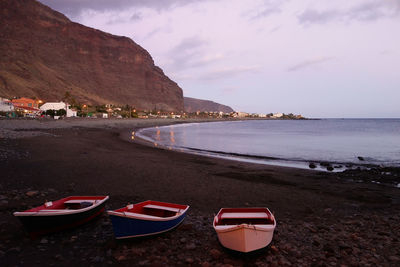 View of beach against sky during sunset