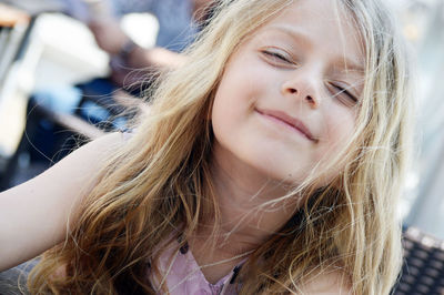 Close-up portrait of smiling girl