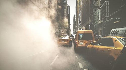 Cars on road in city