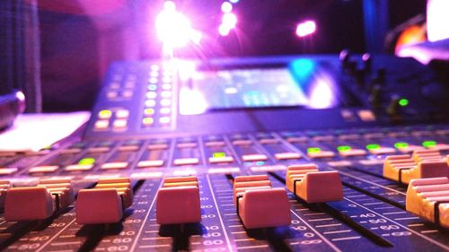 Close-up of sound mixer at concert