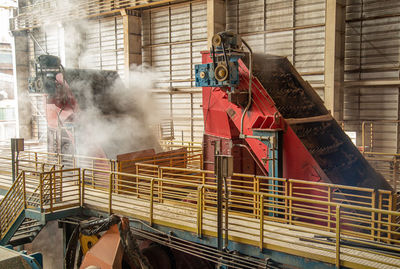 Low angle view of man standing in factory