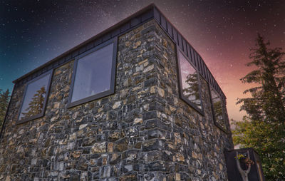 Low angle view of old building against sky