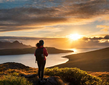 Adventurer's silhouette. a vibrant sunset. sky evoke a sense of wanderlust. beauty of solitude.