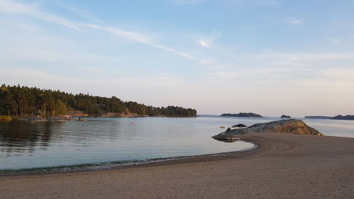 Scenic view of beach against sky