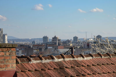 High angle view of buildings in city against sky