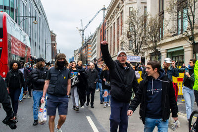 People walking on city street