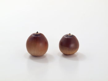 Close-up of fruits on white background