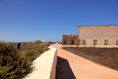 View of building against clear blue sky