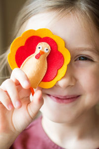 Close-up of girl eating fruit