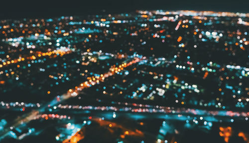 High angle view of illuminated city at night