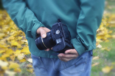 Woman photographing through smart phone