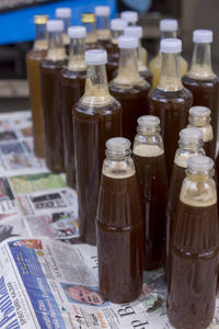 Close-up of wine bottles on table