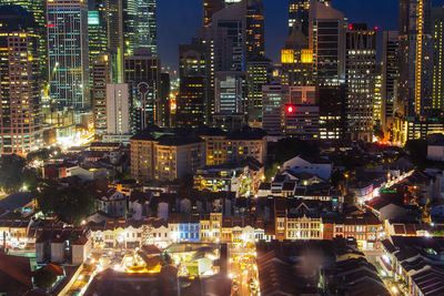 High angle view of illuminated buildings at night