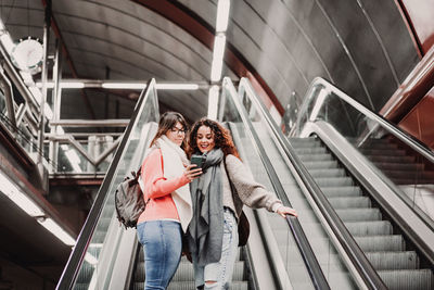 People on escalator