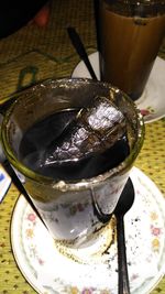 Close-up of coffee cup on table