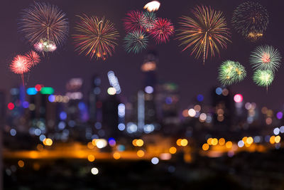 Firework display at night