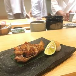 Close-up of fish in plate on table