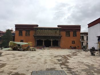 View of building against cloudy sky