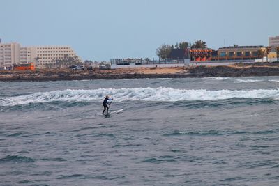 People enjoying at beach