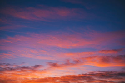 Low angle view of dramatic sky during sunset