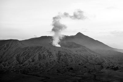 Beautiful view landscape of active volcano crater with smoke at mt. bromo, east java, indonesia.