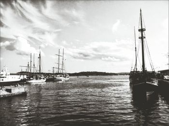 Boats moored in sea