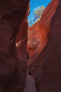 Low angle view of rock formation slot canyon