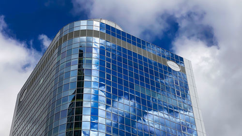 Low angle view of modern building against sky