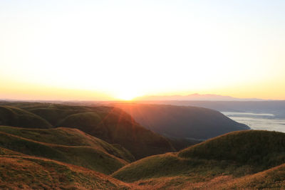 Scenic view of landscape against sky during sunset