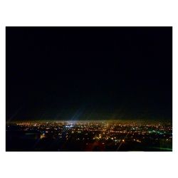 View of illuminated cityscape at night