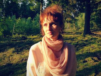 Portrait of woman in forest