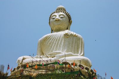 Low angle view of statue against clear sky