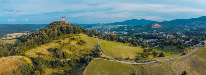 High angle view of landscape and mountains against sky