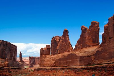 Rock formations against blue sky