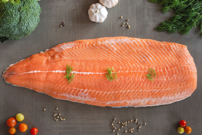 High angle view of orange fish on table