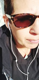 Close-up portrait of a man wearing sunglasses