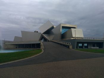 View of buildings against cloudy sky